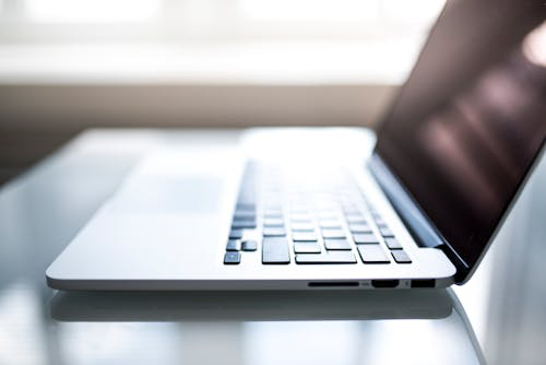 a sleek laptop on a silver table