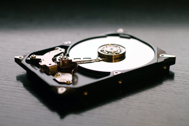 A hard disk drive on black surface