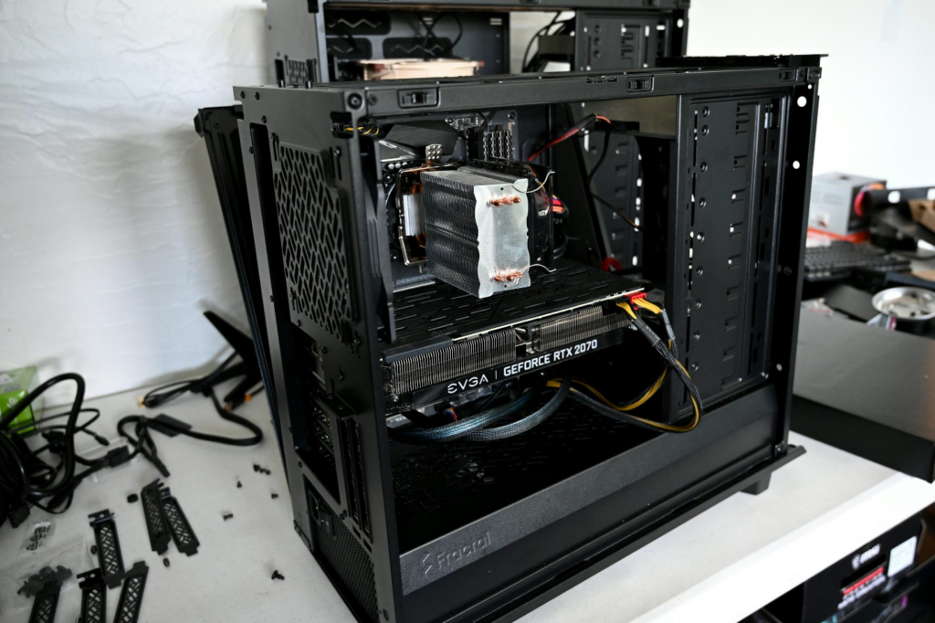 A large CPU machine open with wires.