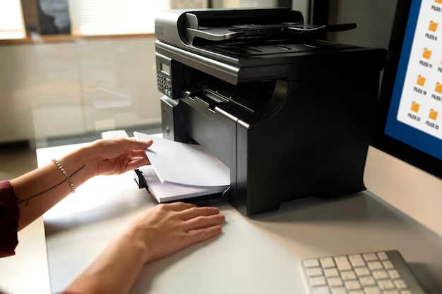 A person using a printer