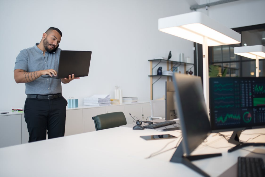 A technician repairing a laptop