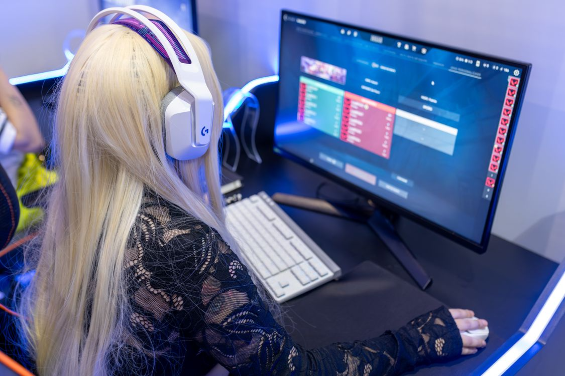 A person playing a video game on a PC
